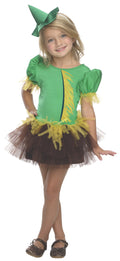 Girl wearing a Wizard of Oz Scarecrow tutu dress with green bodice, straw-fringe sleeves and brown tulle skirt