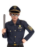 Child wearing the navy police shirt with gold badge and peaked police cap
