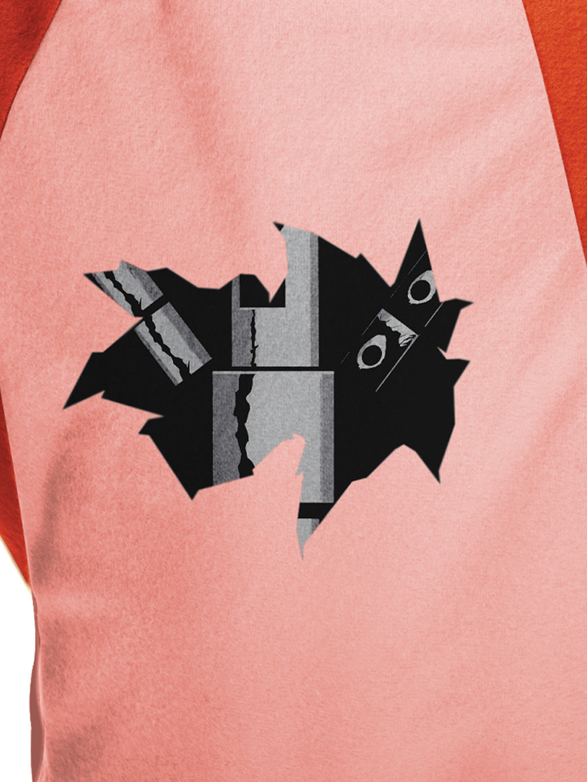 Close-up of the pink belly panel with a torn metal-look print on the Foxy jumpsuit