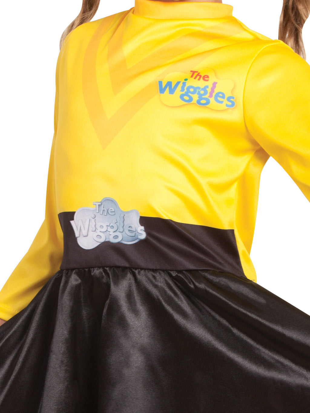 Close-up of the yellow bodice with the printed Wiggles logo and belt above the black satin skirt