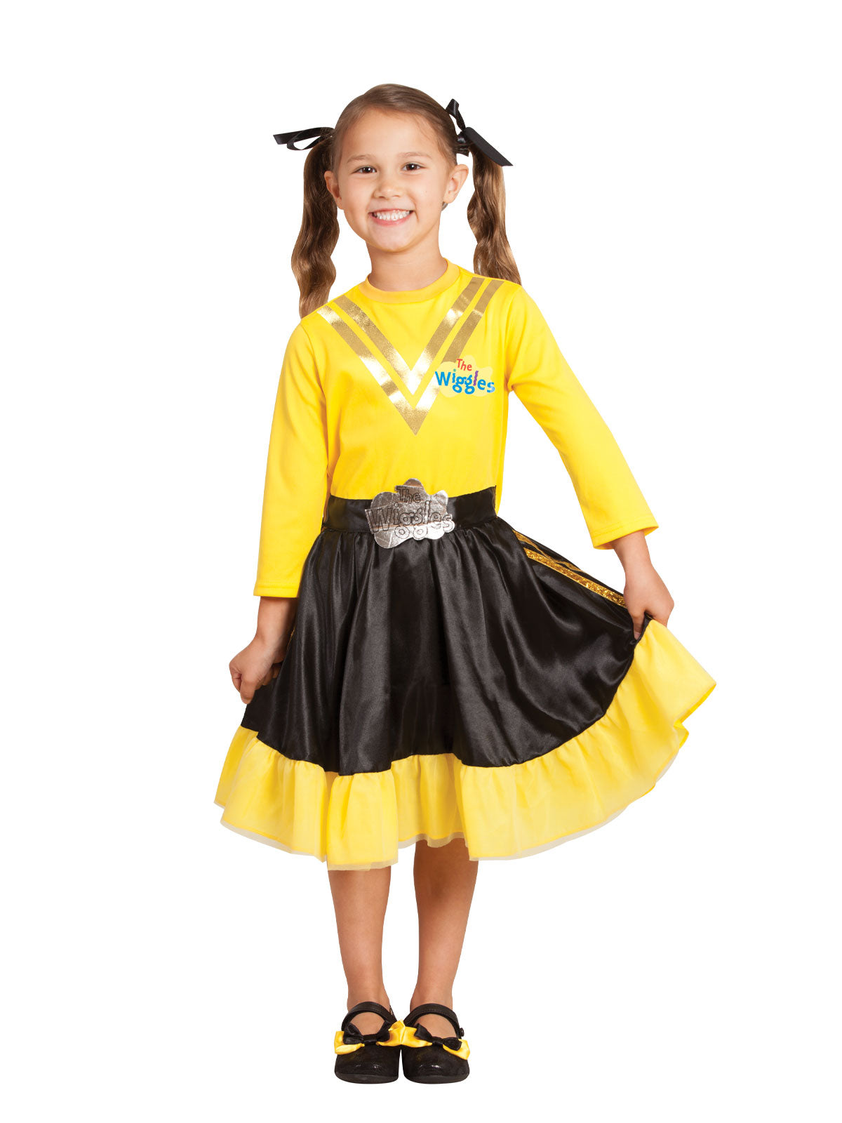 Girl wearing a yellow Wiggles dress with gold foil V stripes, metallic buckle belt and black satin skirt with yellow frill