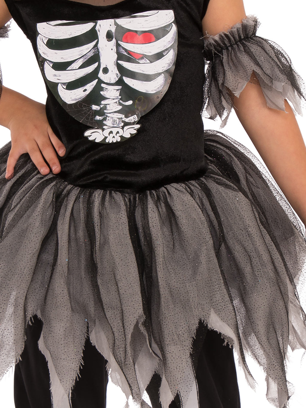 Close-up of the Skelerina dress's skeleton ribcage print, torn tulle tutu and tulle armband