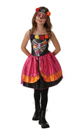 Girl wearing a Sugar Skull dress with rib and floral print bodice, satin roses, ombre pink skirt and rose headpiece