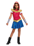 Girl wearing a hooded Wonder Woman dress with star bodice, gold logo collar, blue star skirt, belt and gauntlets