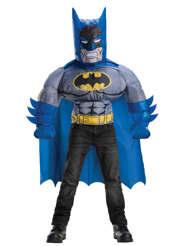 Boy in inflatable Batman muscle top with blue cowl, gloves and cape