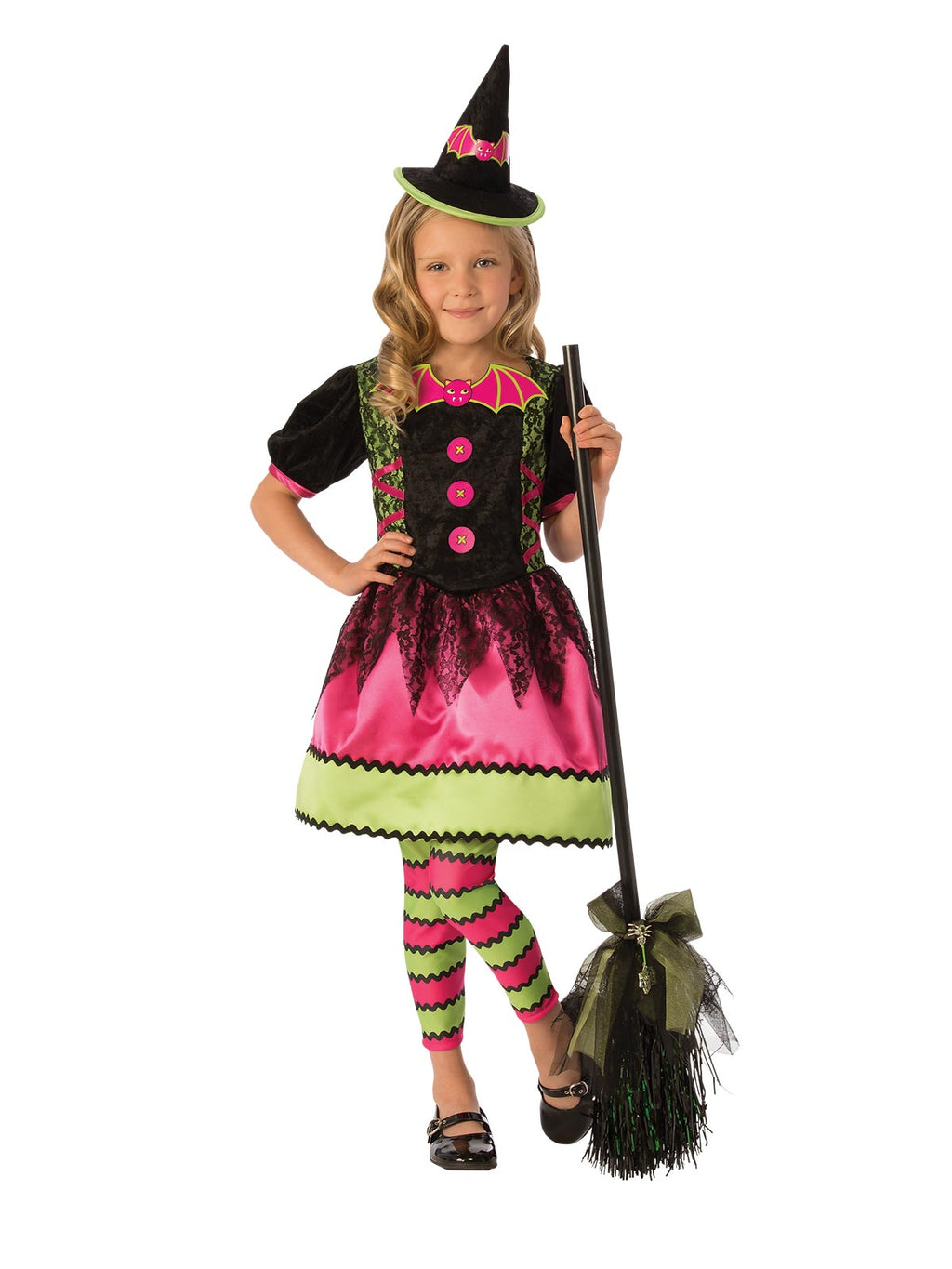 Girl in pink and black witch dress with zigzag trim, striped tights and pointed witch hat