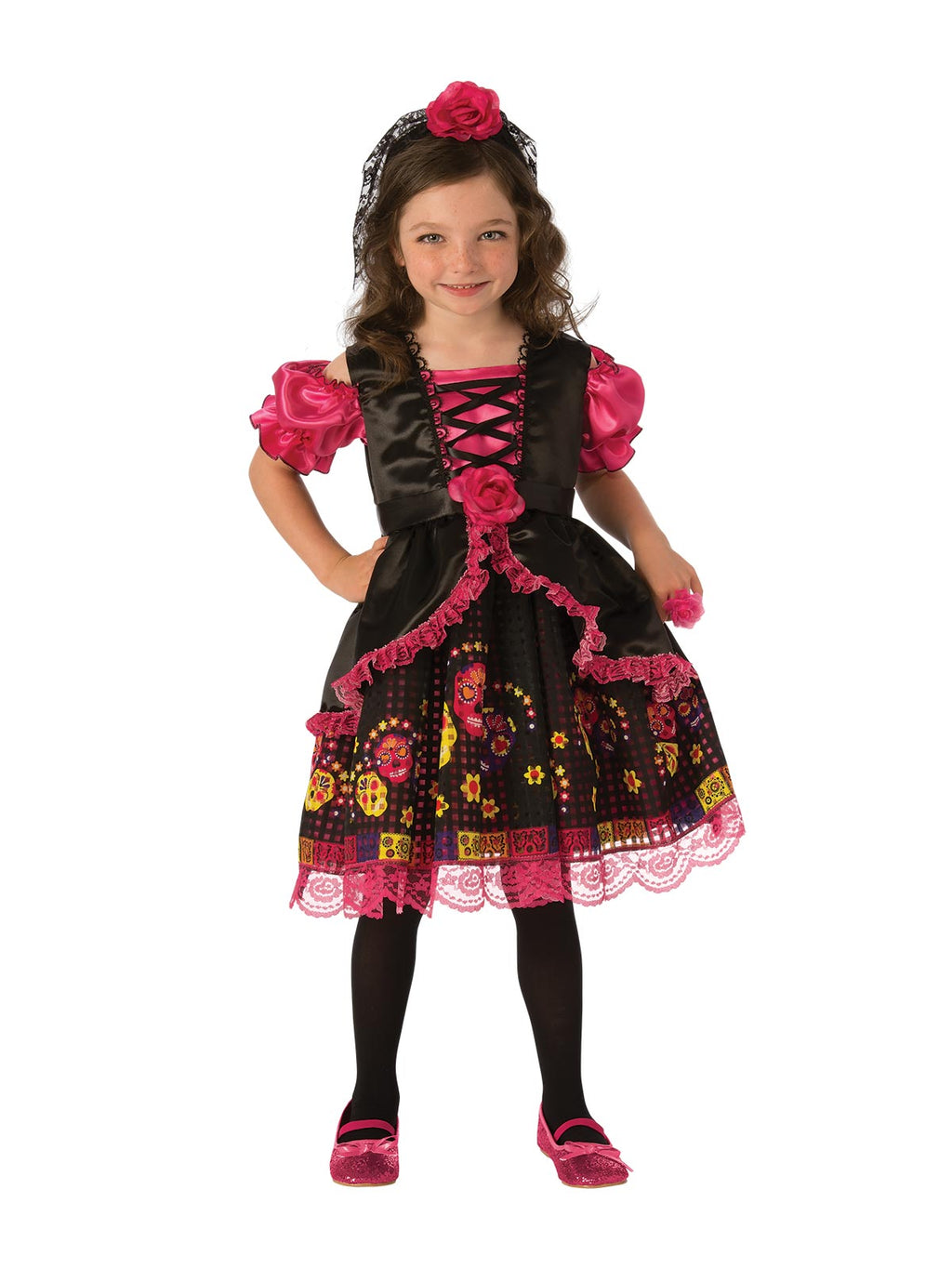 Girl in Day of the Dead dress with black bodice, pink puff sleeves, printed lace skirt and rose headband