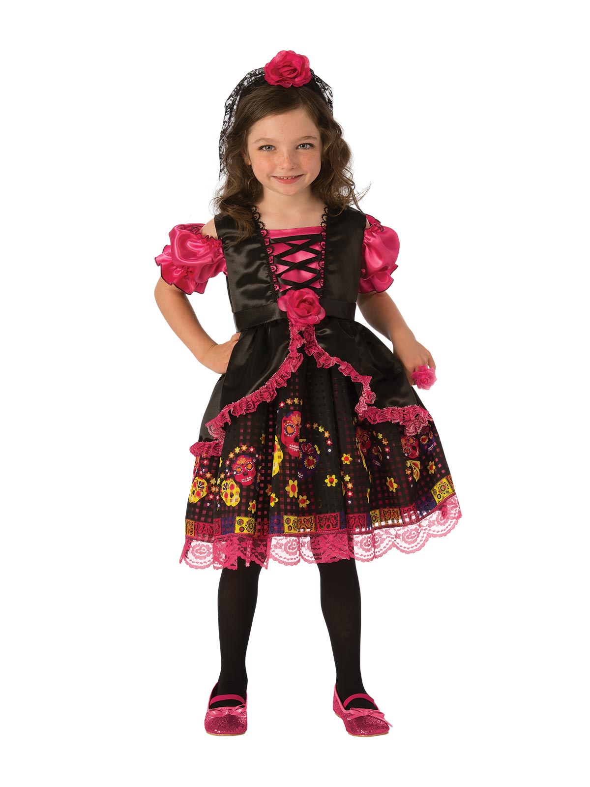 Girl in Day of the Dead dress with black bodice, pink puff sleeves, printed lace skirt and rose headband