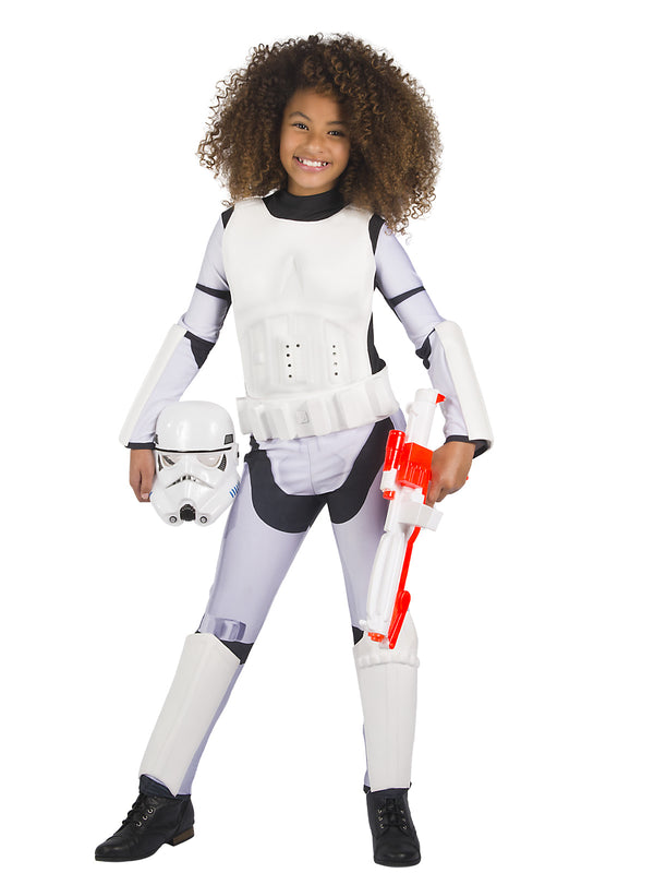 Girl wearing a Stormtrooper jumpsuit with moulded foam armour, belt and moulded mask held under the arm