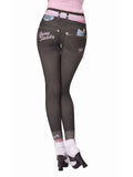 Legs wearing dark 50s jean leggings with printed pink belt and slogan back pockets, back view