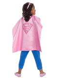 Back view of a girl wearing the pink Supergirl cape with S logo and headband