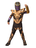 Child in a Thanos jumpsuit with gold armour-print tabard, attached gauntlet, shoe covers and purple moulded mask