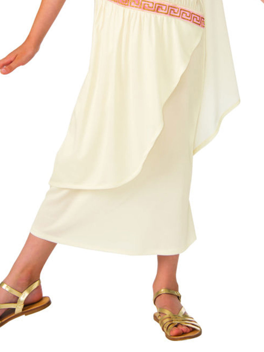 Close-up of the Roman girl dress's draped skirt and printed gold and pink belt