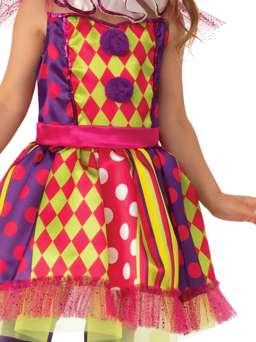 Close-up of the bright clown dress's pink, yellow and purple harlequin print and tulle hem