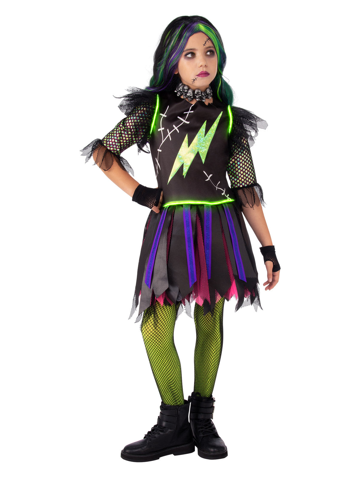 Girl in the Frankie Light Up costume with a black dress, green lightning bolt and multicoloured ragged skirt