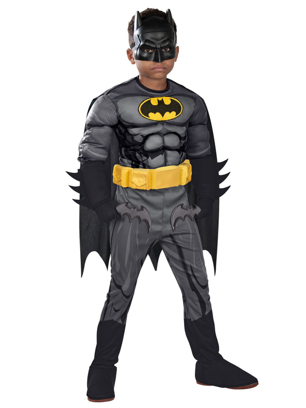 Boy in premium Batman muscle jumpsuit with yellow bat emblem and belt, gauntlets, cape and half mask