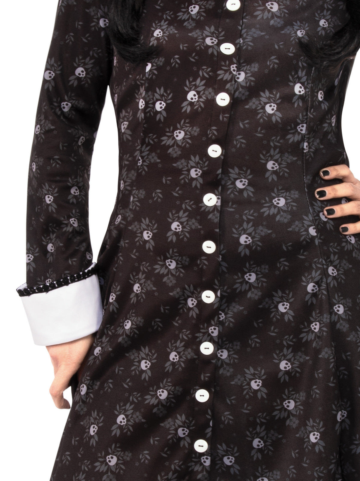 Close-up of the Wednesday Addams dress's skeleton print, buttons and white cuff