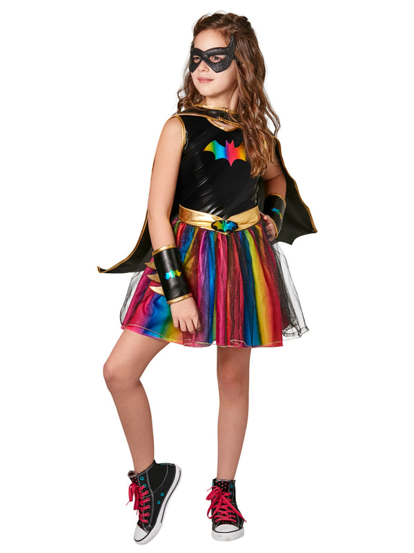 Girl in Batgirl rainbow tutu dress with black bodice, rainbow bat emblem, mask and cape