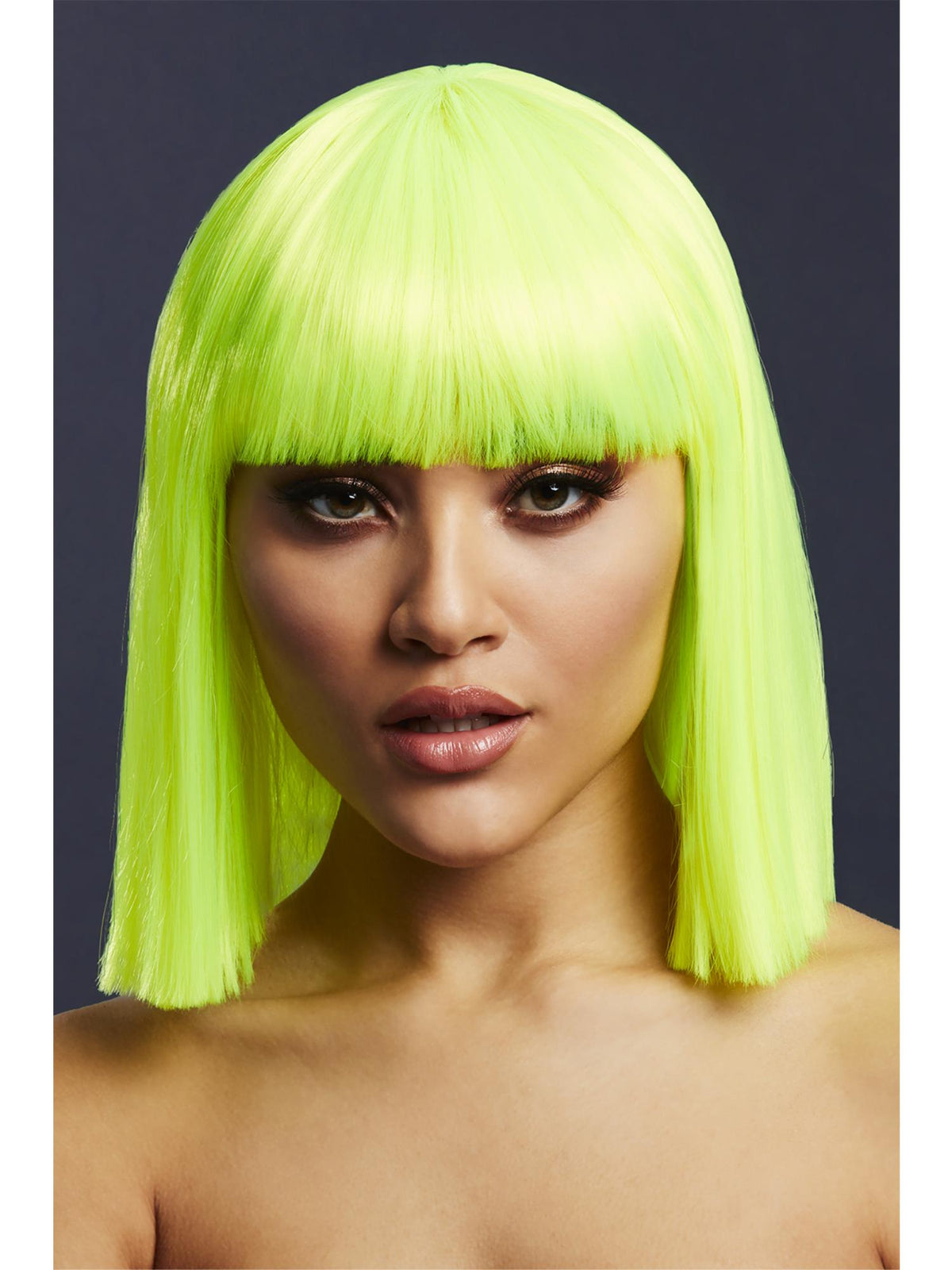 Woman wearing a neon lime shoulder-length bob wig with a straight fringe
