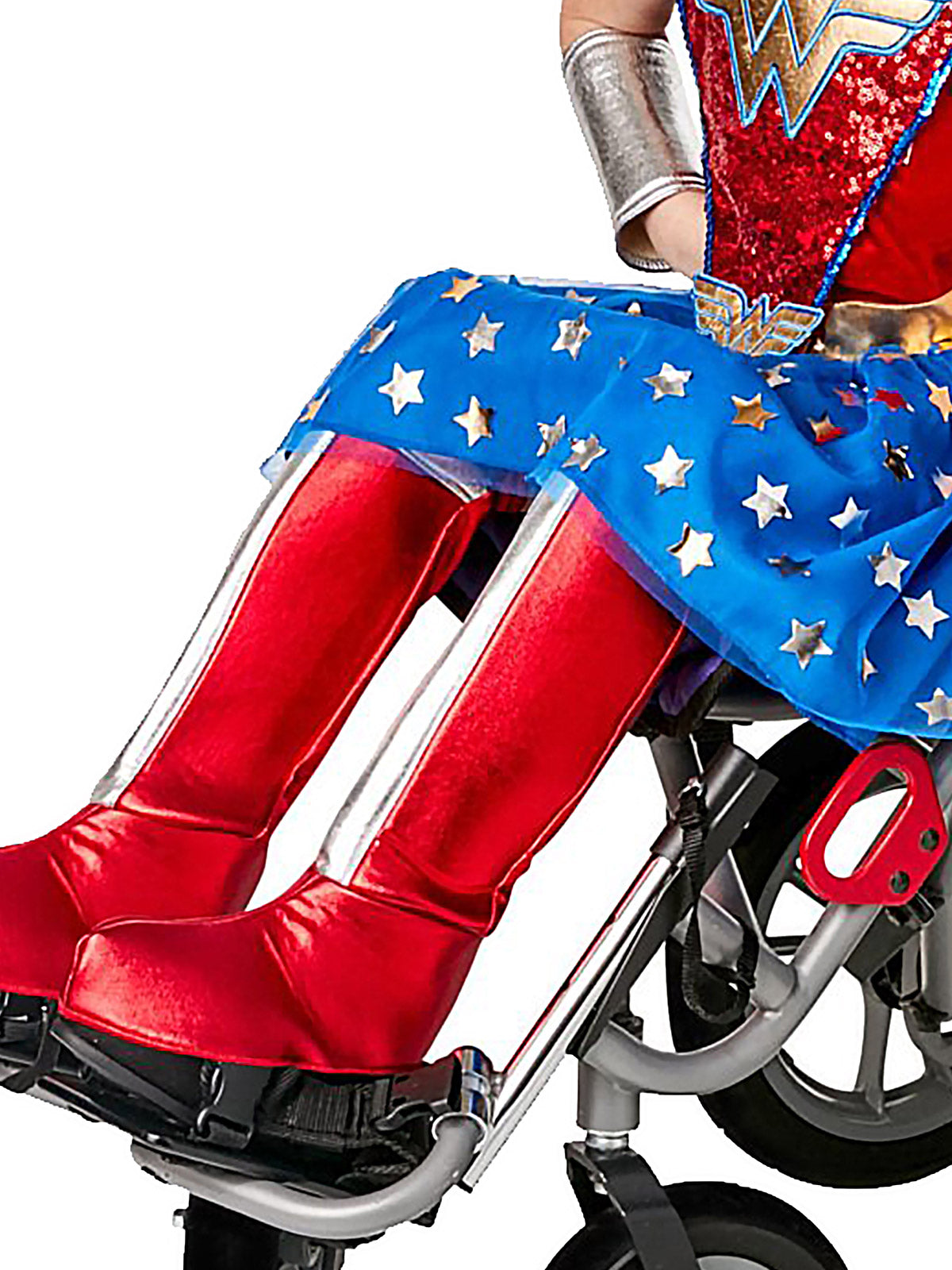 Close-up of the adaptive Wonder Woman costume's metallic red and silver boot covers and star-print skirt