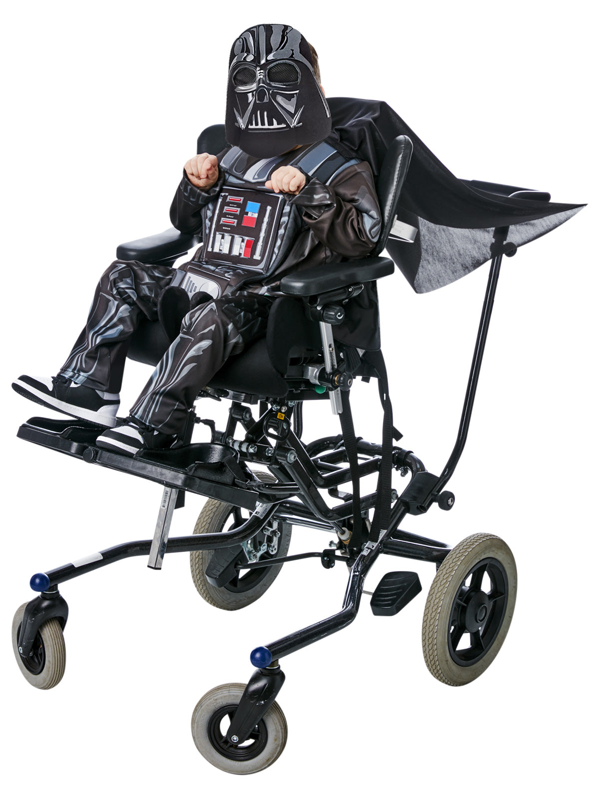 Child using a wheelchair in the Darth Vader adaptive costume with printed top, cape and mask