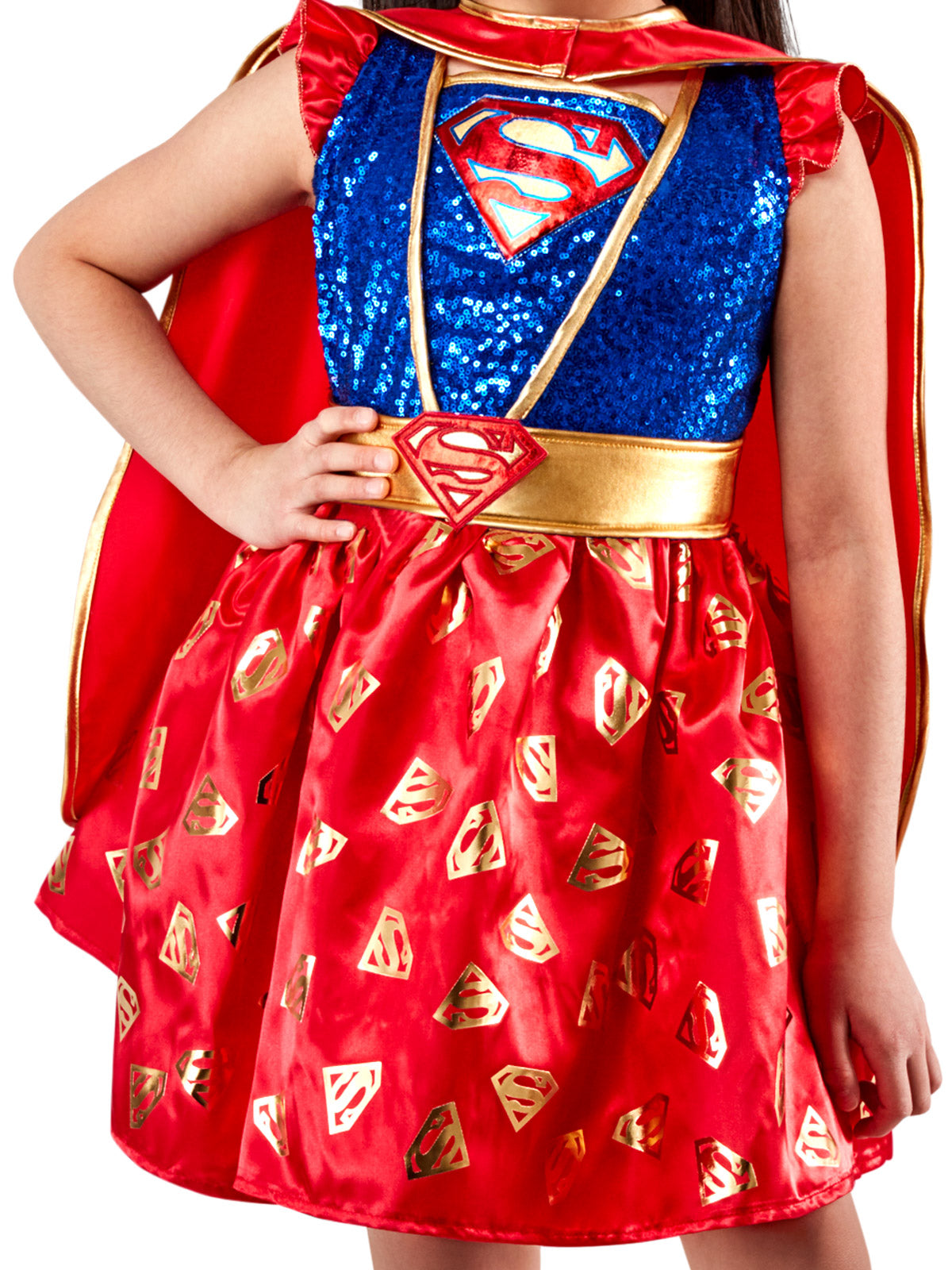 Close-up of the Supergirl premium dress with a sequined blue bodice and a red skirt printed with gold emblems