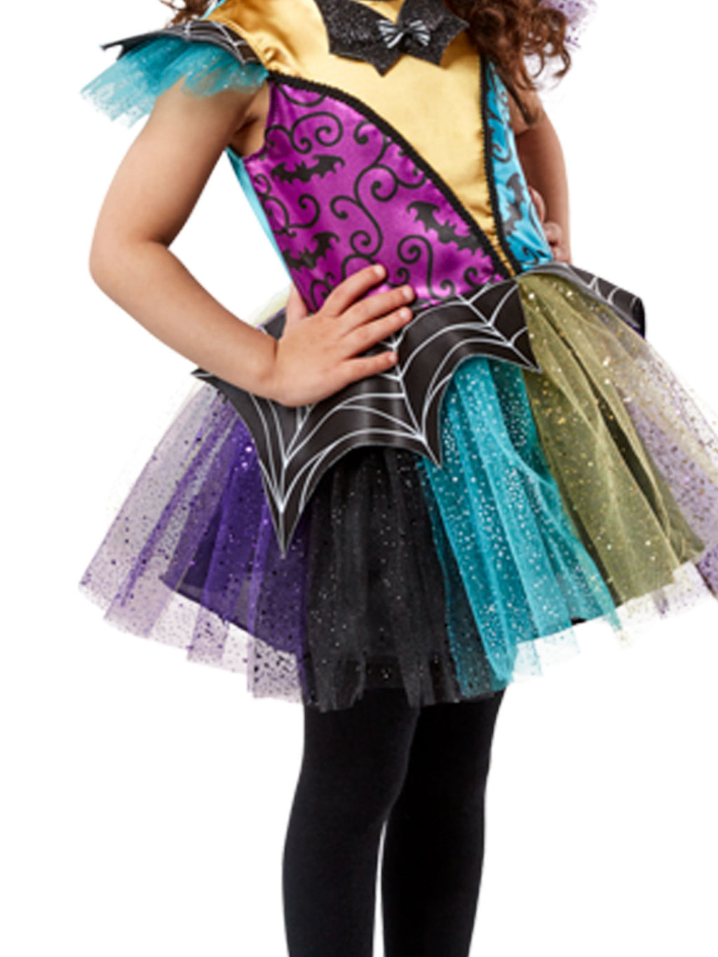 Girl in the Patchwork Witch tutu dress with a purple bodice, cobweb peplum and purple, teal and green tulle skirt