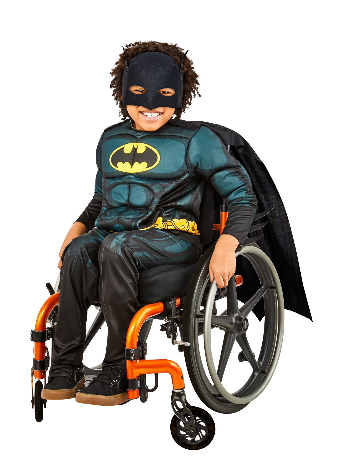Batman adaptive costume worn seated, showing the padded muscle top, printed belt and removable cape
