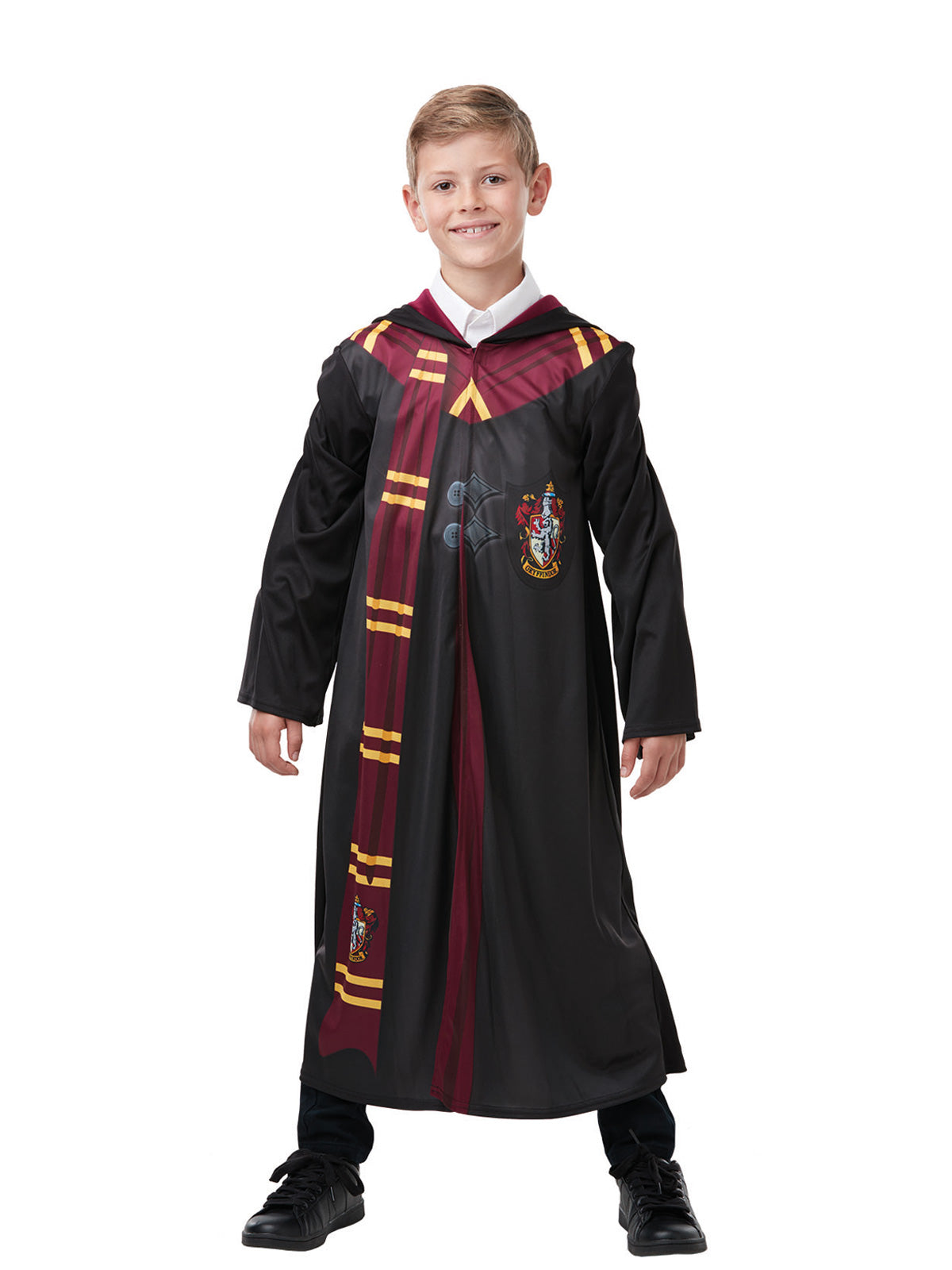 Boy in the Harry Potter Gryffindor robe with a burgundy and gold striped scarf and House crest