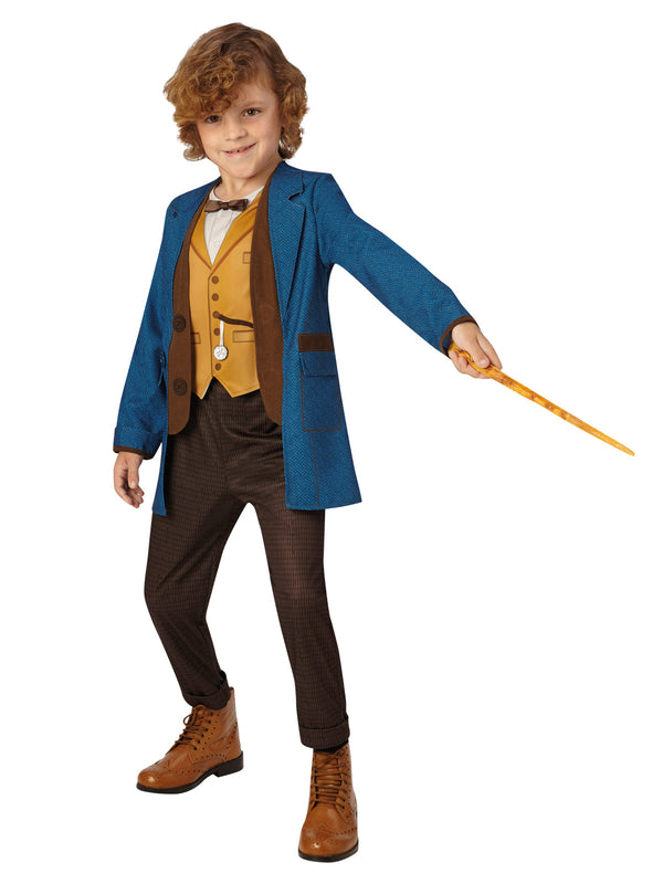 Boy in the Fantastic Beasts Newt Scamander Deluxe costume with a blue long coat, mustard vest and brown pants