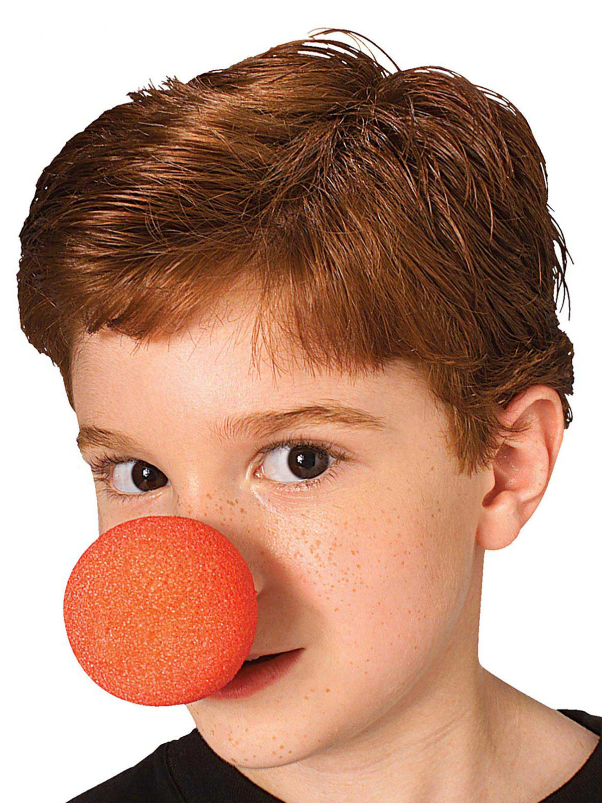 Boy wearing an oversized red foam clown nose