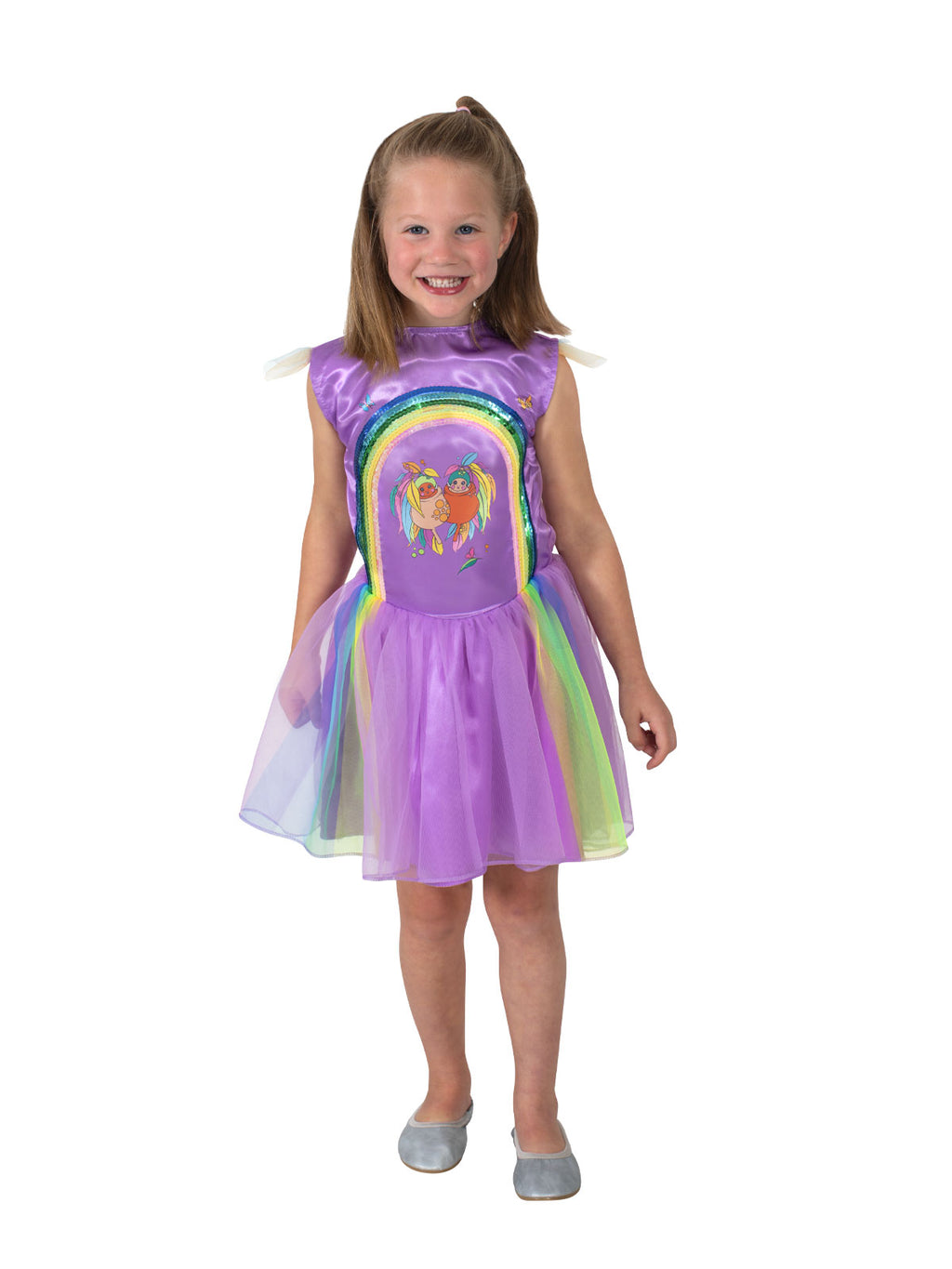 Girl in the Gumnut Baby Kasey Rainbow tutu dress in purple with a rainbow sequin overlay and leafy sleeves