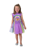 Girl in the Gumnut Baby Kasey Rainbow tutu dress in purple with a rainbow sequin overlay and leafy sleeves