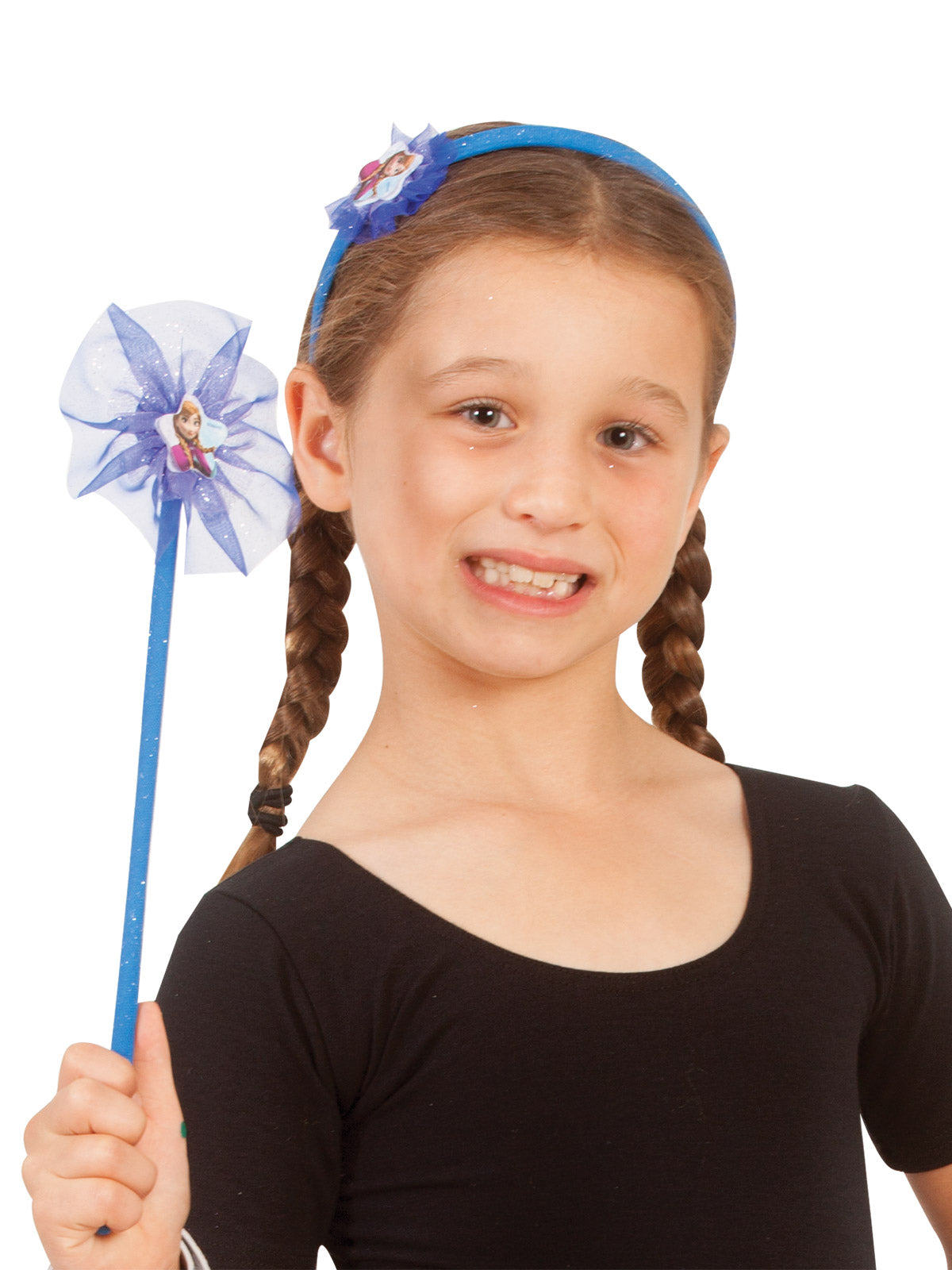 Girl wearing a blue Anna headband and holding a matching star wand
