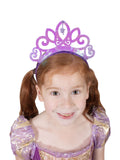 Girl wearing the purple iridescent Rapunzel tiara with a flower centre