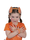 Girl wearing the orange Emma Memma butterfly headband and matching wristlet