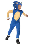 Boy in the Sonic the Hedgehog jumpsuit with a blue spiked hood and tan chest panel, shown in a running pose