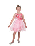 Girl in the Wicked For Good Glinda dress with a sparkly pink bodice and layered tulle skirt