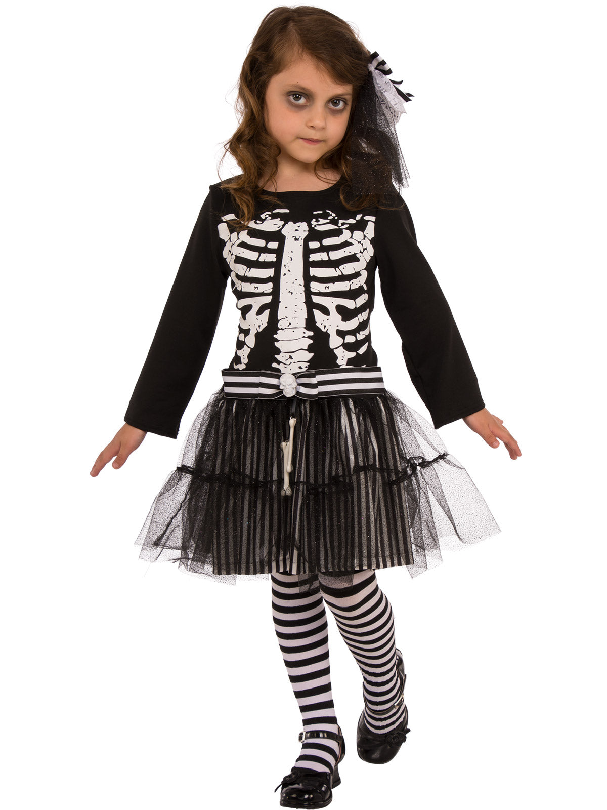 Girl in the Little Skeleton tutu dress with a bone-print bodice, black tulle skirt and bow headpiece