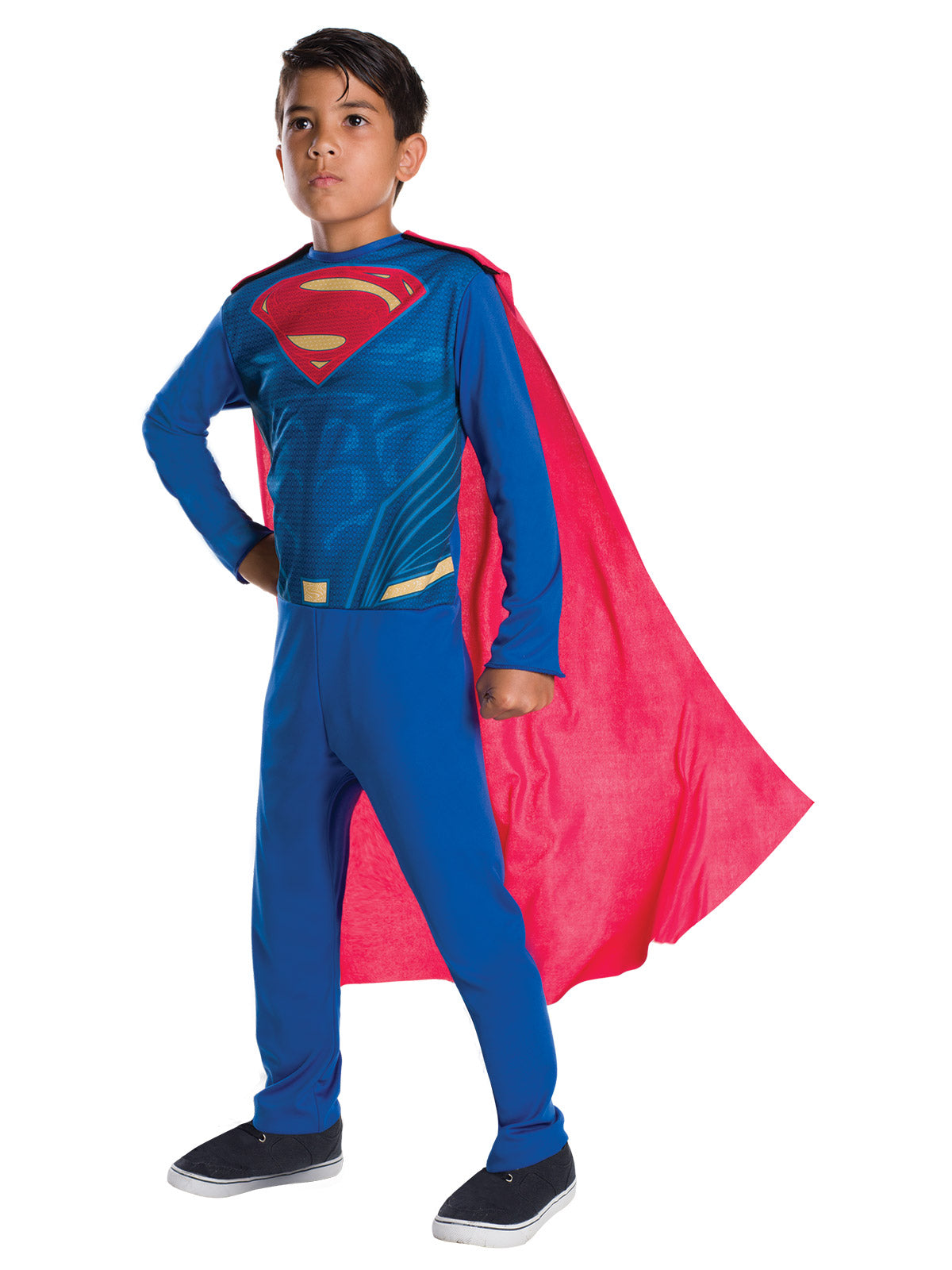 Boy in a Superman costume with printed S emblem bodice, plain blue pants and red cape