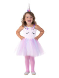 Girl wearing a pastel unicorn tutu dress with crochet-knit bodice, glitter ears and lashes, and silver horn headpiece