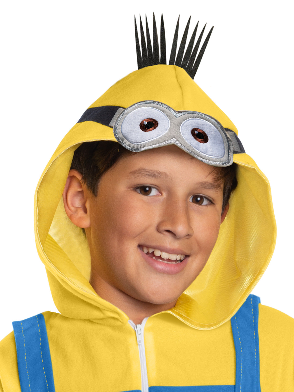Boy in the Minions Despicable Me 4 hooded yellow and blue onesie with Minion goggles and spiky hair
