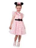 Girl in the Disney Minnie Mouse Pink Premium dress with a heart print tulle skirt, black bow belt and ears headband