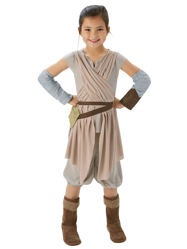 Girl wearing a Rey costume with cream wrap tunic, double belt, shorts and arm gauntlets
