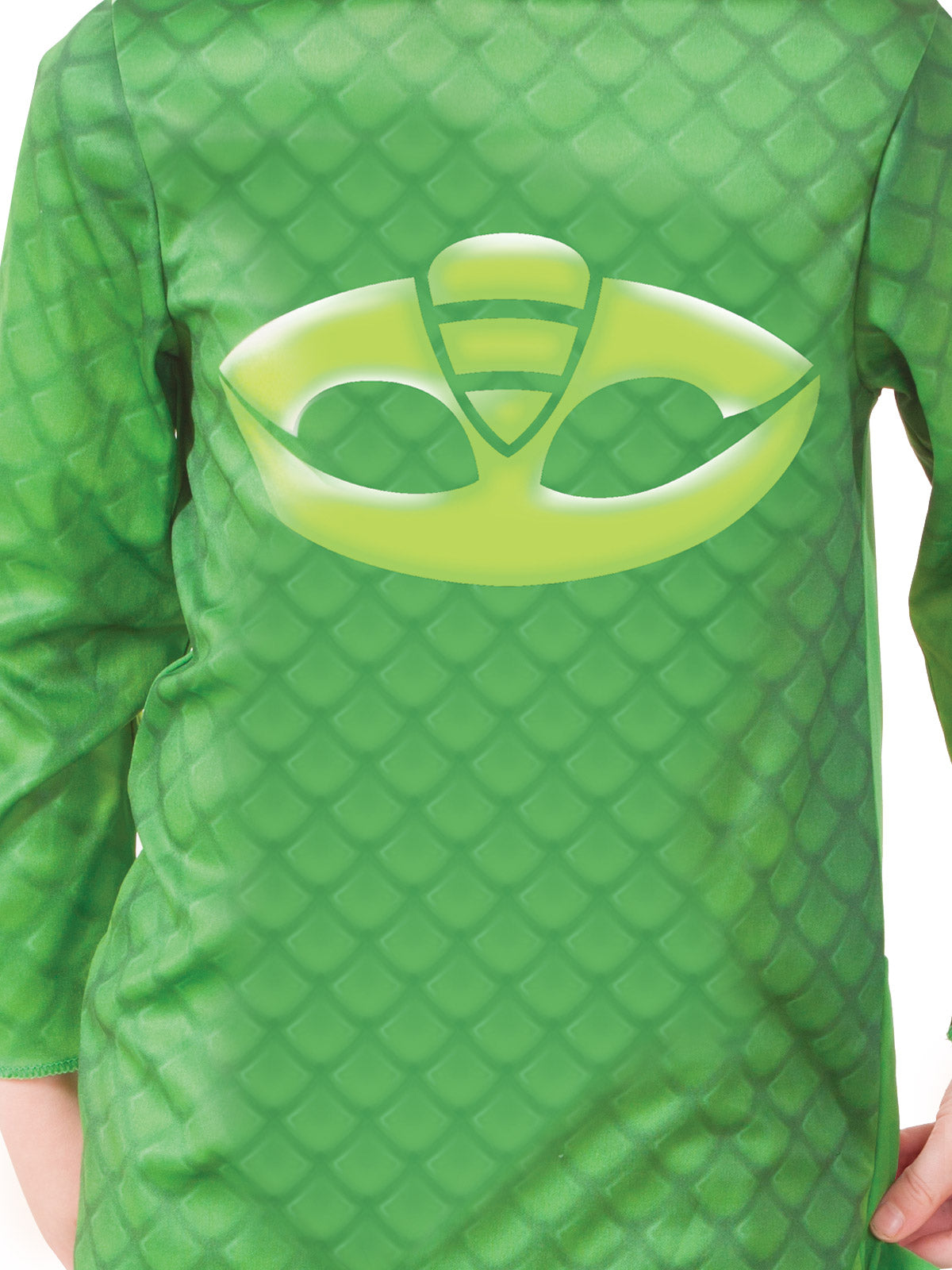 Close-up of the Gekko jumpsuit's printed emblem