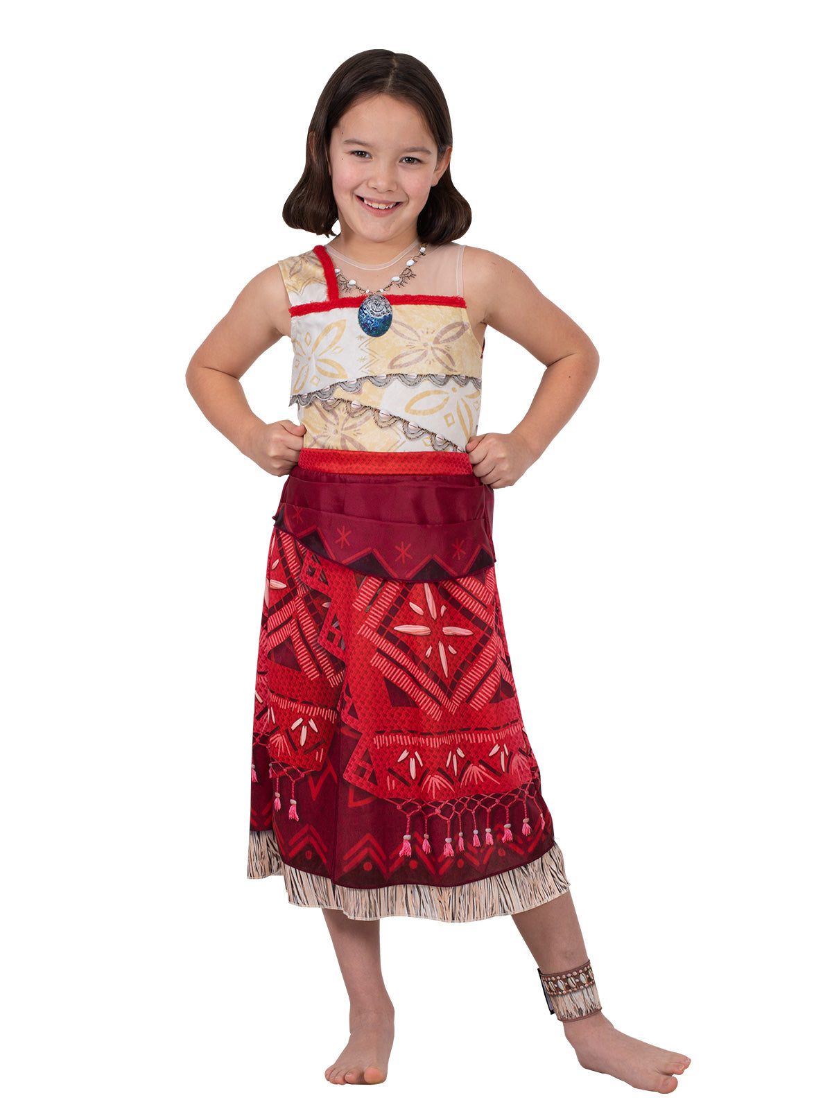 Girl with hands on hips in the Moana Deluxe dress with red patterned skirt and ankle cuff