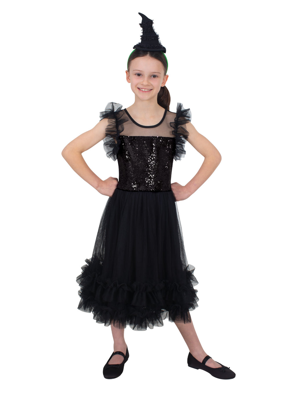 Girl in the Elphaba dress with frilled shoulders and a layered black tulle skirt, arms out
