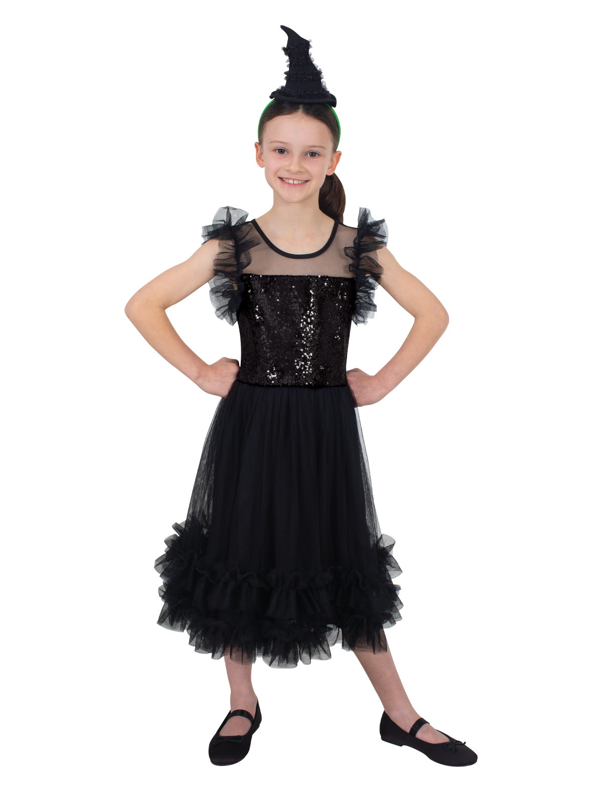 Girl in the Elphaba dress with frilled shoulders and a layered black tulle skirt, arms out