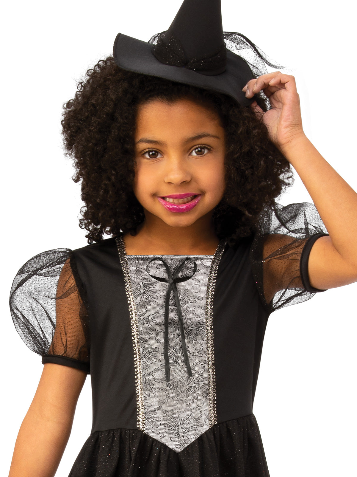 Close-up of the black witch dress's silver patterned bodice, bow and tulle-trimmed mini hat