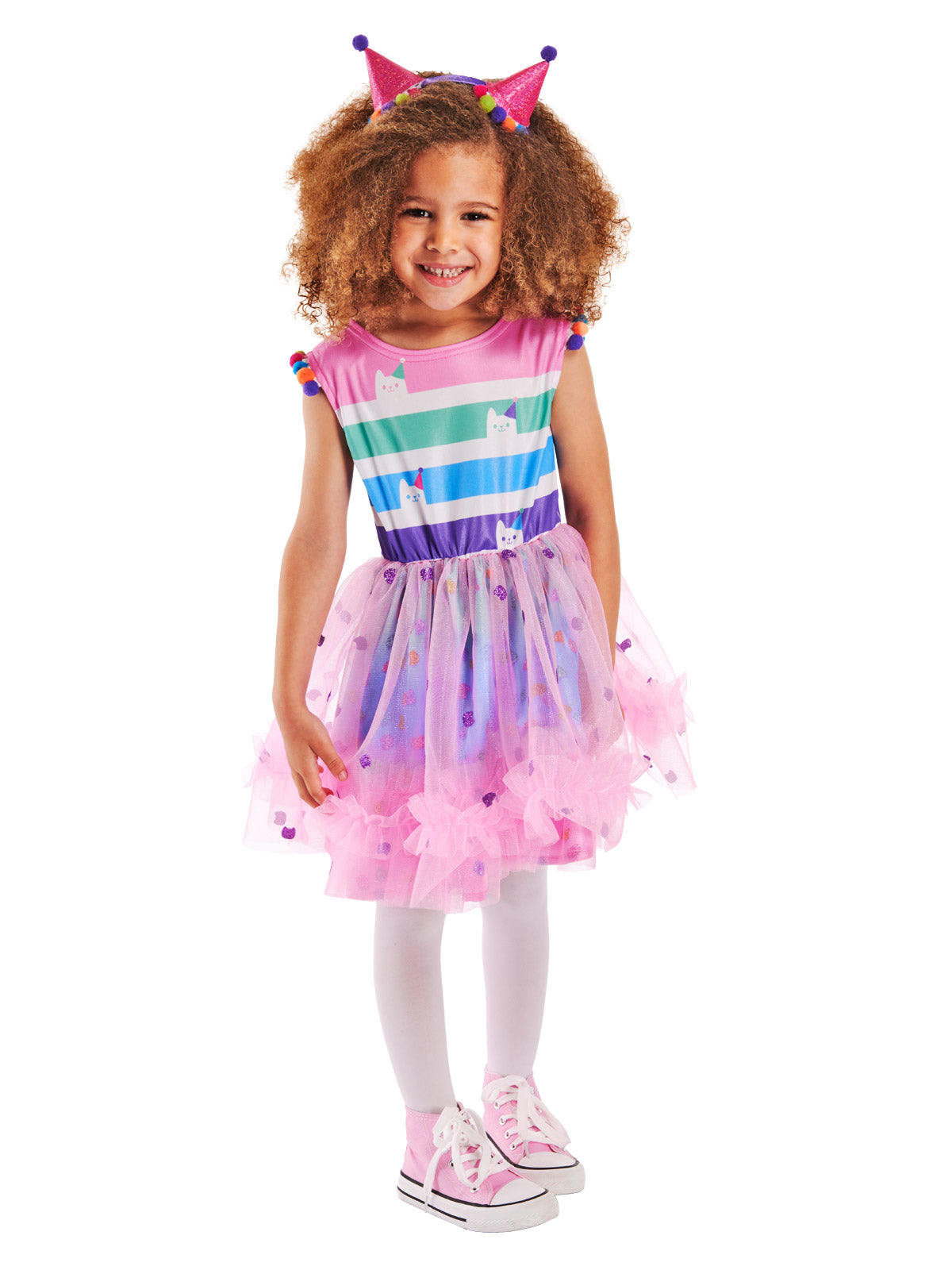 Girl smiling in the Gabby's Party dress with a pastel striped top and pink and purple tulle skirt